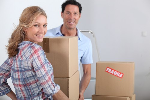 Loading household items into a van for a Bromley relocation