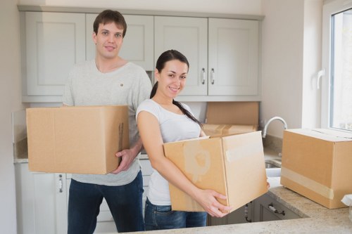 Local movers organising fragile items for transport in Bromley